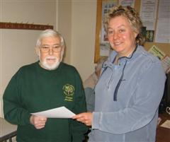 The monthly winner Norman Smithers received his certificate From Joey Richardson 
